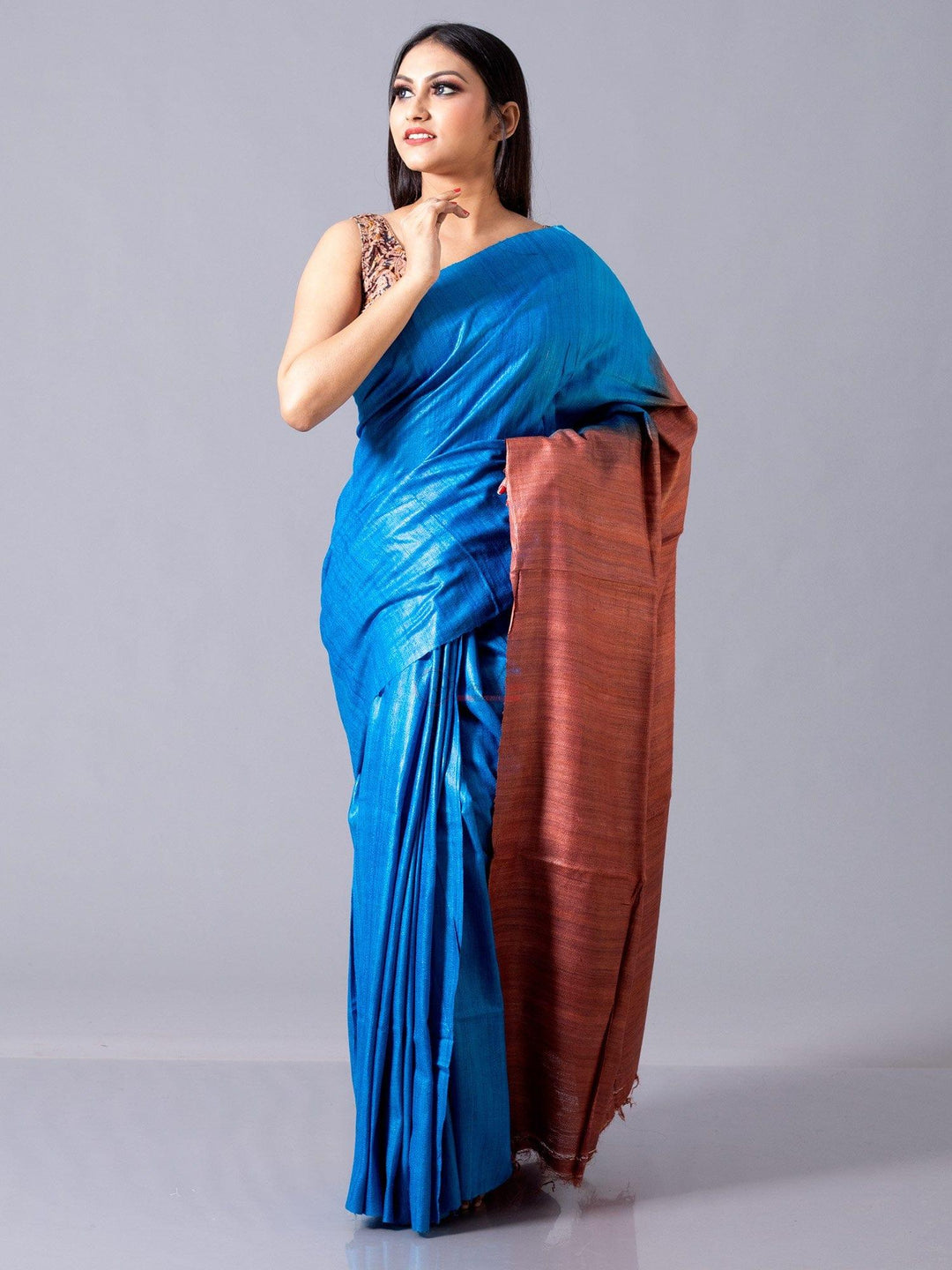 Wonderful True Blue With Rust Body Anchal Ghicha Silk Saree - WeaversIndia