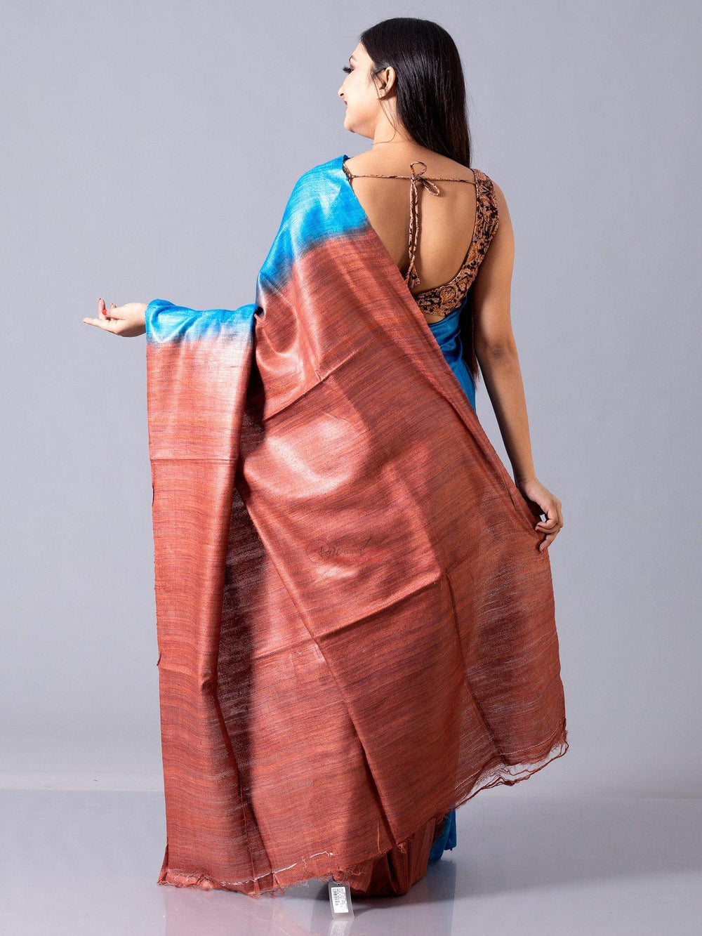 Wonderful True Blue With Rust Body Anchal Ghicha Silk Saree - WeaversIndia